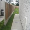 Overlap Panels in Concrete Posts and with Gravel Board
